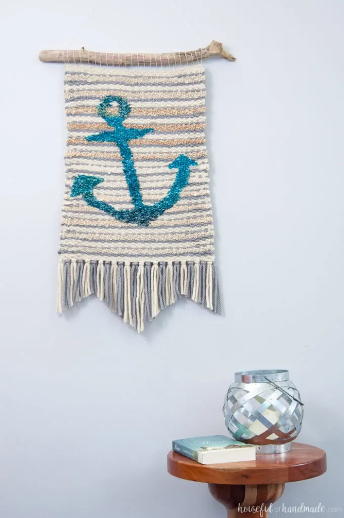 Create beautiful textured art for your walls with a DIY weaving. I decided to try out weaving for the first time and am sharing what I learned while making a Woven Anchor Wall Hanging. It was so much fun, I am already planning on a second project. | Housefulofhandmade.com