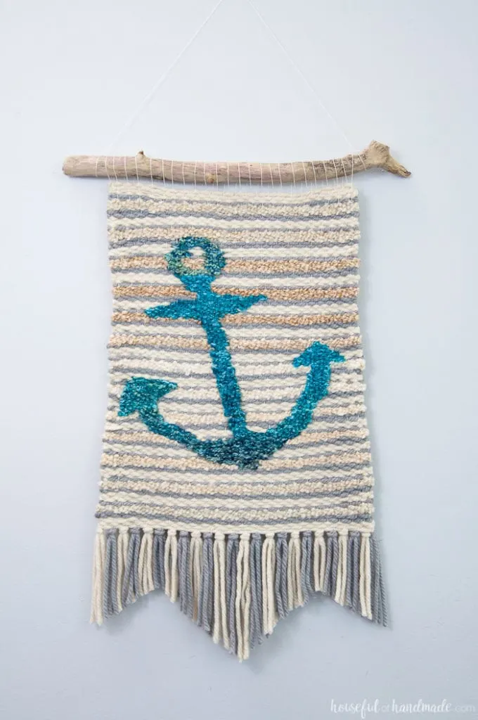 Create beautiful textured art for your walls with a DIY weaving. I decided to try out weaving for the first time and am sharing what I learned while making a Woven Anchor Wall Hanging. It was so much fun, I am already planning on a second project. | Housefulofhandmade.com