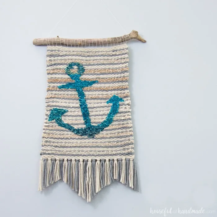 Create beautiful textured art for your walls with a DIY weaving. I decided to try out weaving for the first time and am sharing what I learned while making a Woven Anchor Wall Hanging. It was so much fun, I am already planning on a second project. | Housefulofhandmade.com