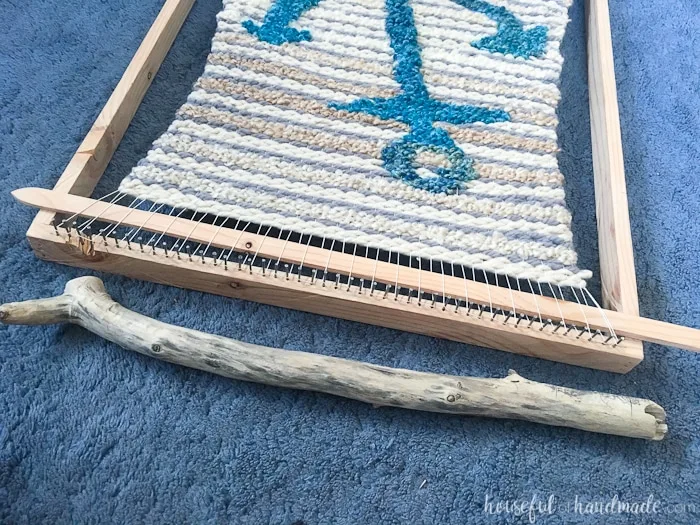 Create beautiful textured art for your walls with a DIY weaving. I decided to try out weaving for the first time and am sharing what I learned while making a Woven Anchor Wall Hanging. It was so much fun, I am already planning on a second project. | Housefulofhandmade.com