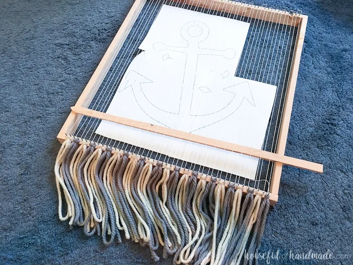 Create beautiful textured art for your walls with a DIY weaving. I decided to try out weaving for the first time and am sharing what I learned while making a Woven Anchor Wall Hanging. It was so much fun, I am already planning on a second project. | Housefulofhandmade.com