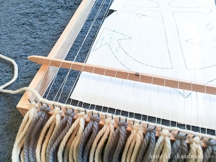 Create beautiful textured art for your walls with a DIY weaving. I decided to try out weaving for the first time and am sharing what I learned while making a Woven Anchor Wall Hanging. It was so much fun, I am already planning on a second project. | Housefulofhandmade.com