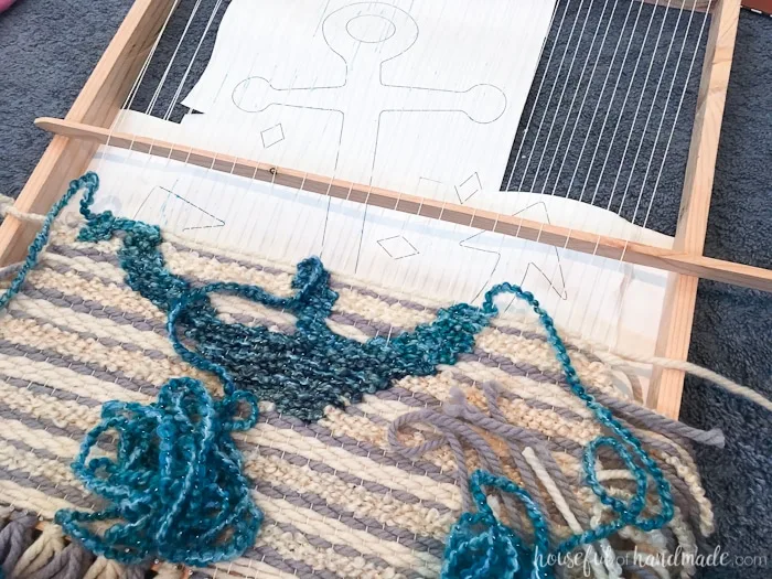 Create beautiful textured art for your walls with a DIY weaving. I decided to try out weaving for the first time and am sharing what I learned while making a Woven Anchor Wall Hanging. It was so much fun, I am already planning on a second project. | Housefulofhandmade.com