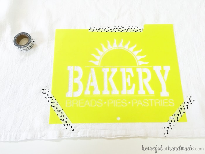 I want to make a bunch of these tea towels for gifts! These easy to make DIY bakery tea towels are a great way to add vintage charm to your kitchen or to give as gifts. Learn how to make a plastic stencil with your Silhouette to paint on inexpensive store bought flour sack towels. | Housefulofhandmade.com