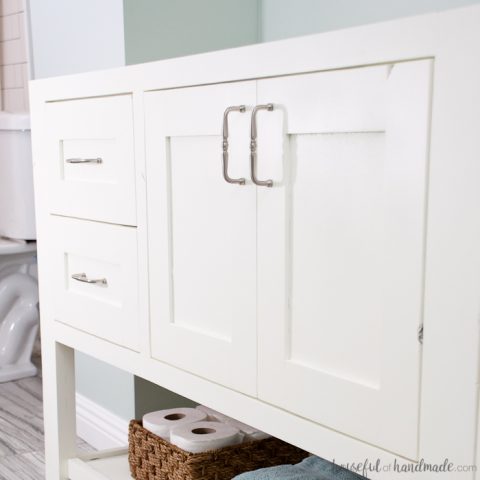 White painted bathroom vanity during a DIY bathroom remodel.