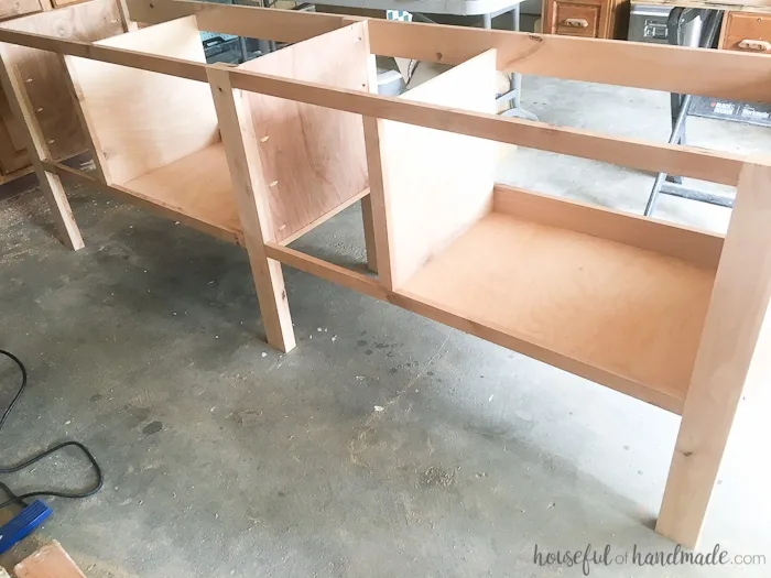 Picture of the double vanity in the process of being built with knotty alder wood and plywood. 