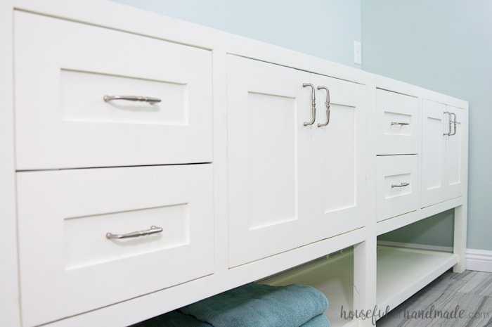 Full picture of the installed double sink bathroom vanity with a smooth professional paint finish on it. 