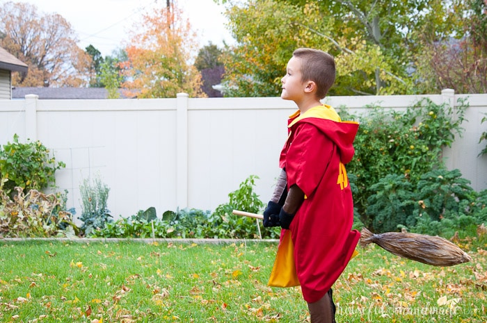 I want this costume for myself! Turn a simple robe pattern into a Harry Potter Quidditch Robes halloween costume with a couple easy adjustments. Also make your own Gryffindor house patch, arm and leg pads, and a Nimbus 2000 so you are ready for the big game. | Housefulofhandmade.com