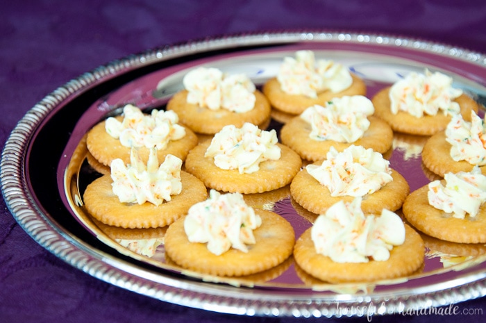 tray of crackers as a snack for a masquerade ball themed birthday