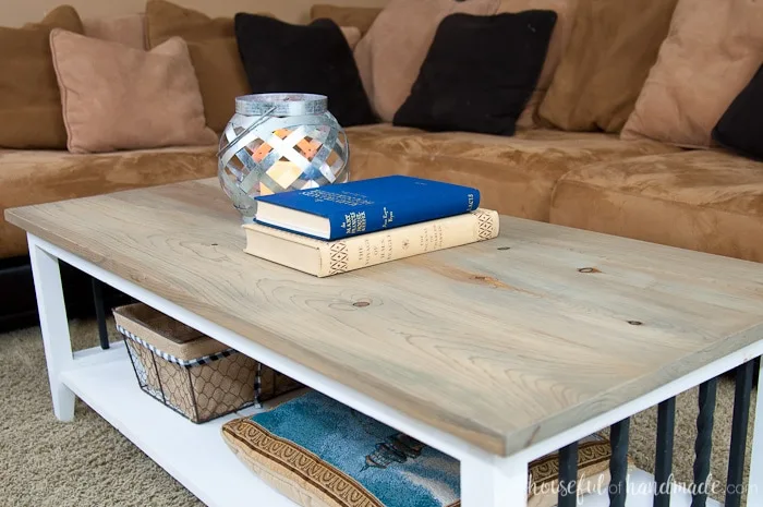 I love this simple, rustic open shelf coffee table. Create the perfect place to relax with this easy to build farmhouse coffee table. Get the free build plans today. | Housefulofhandmade.com