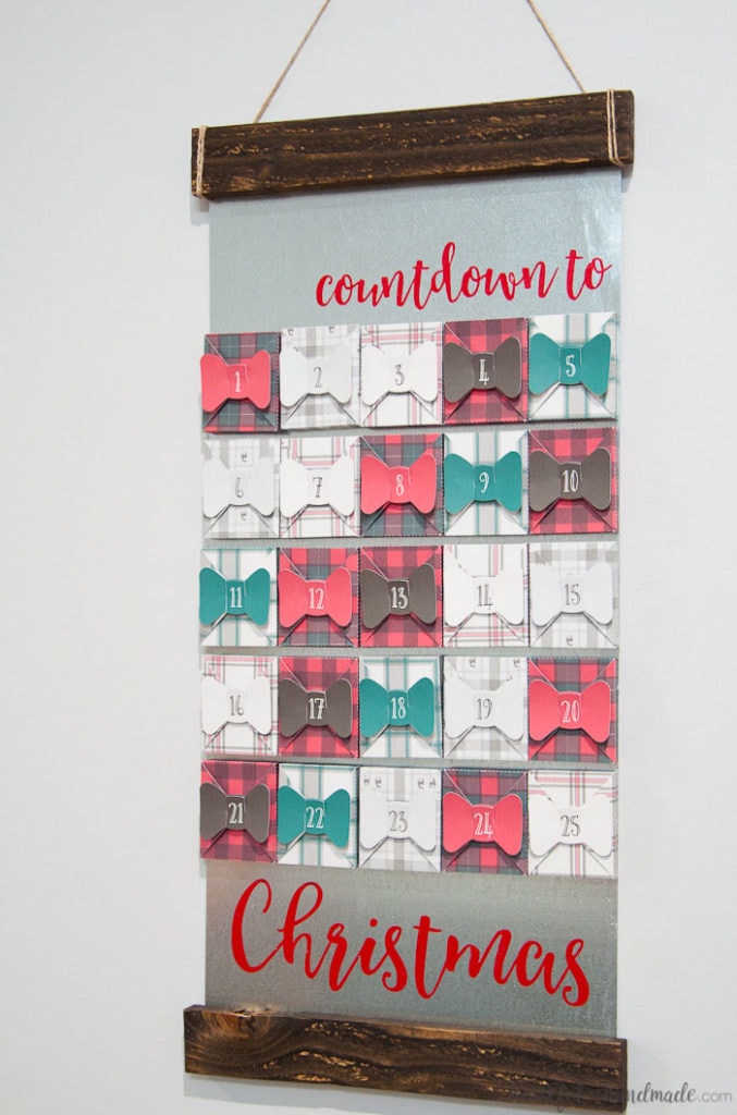 farmhouse style advent calendar hanging on wall.