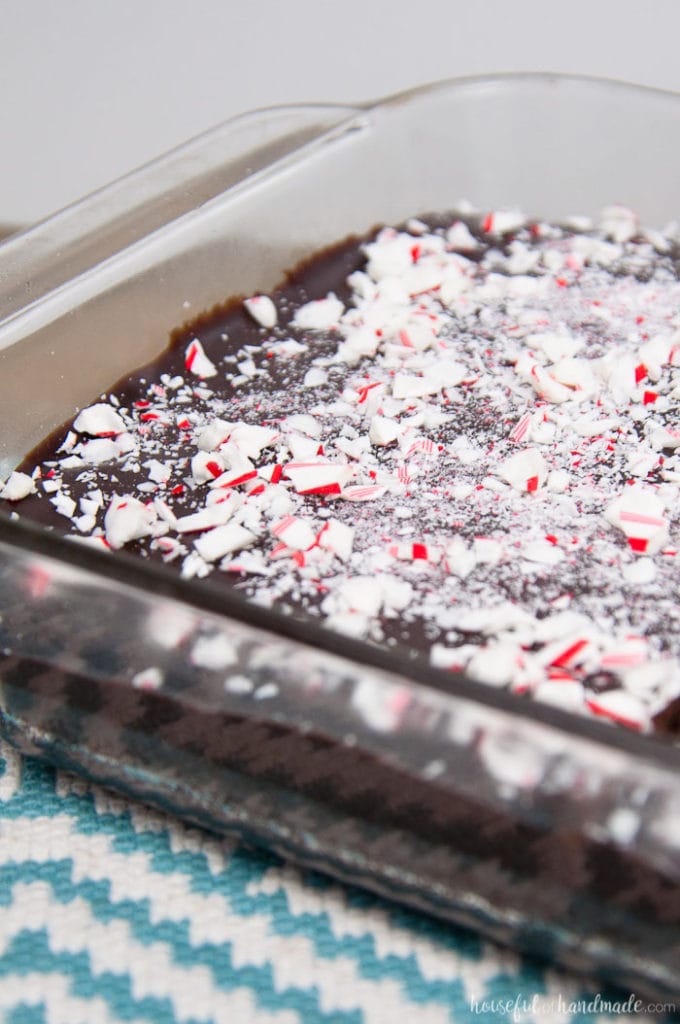 These are the perfect brownies for Christmas! You are going to fall in love with these easy to make Chewy Brownies with Peppermint Ganache. These fudge brownies make the best treats for the season. | Recipe at Housefulofhandmade.com