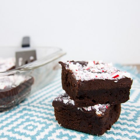 These are the perfect brownies for Christmas! You are going to fall in love with these easy to make Chewy Brownies with Peppermint Ganache. These fudge brownies make the best treats for the season. | Recipe at Housefulofhandmade.com
