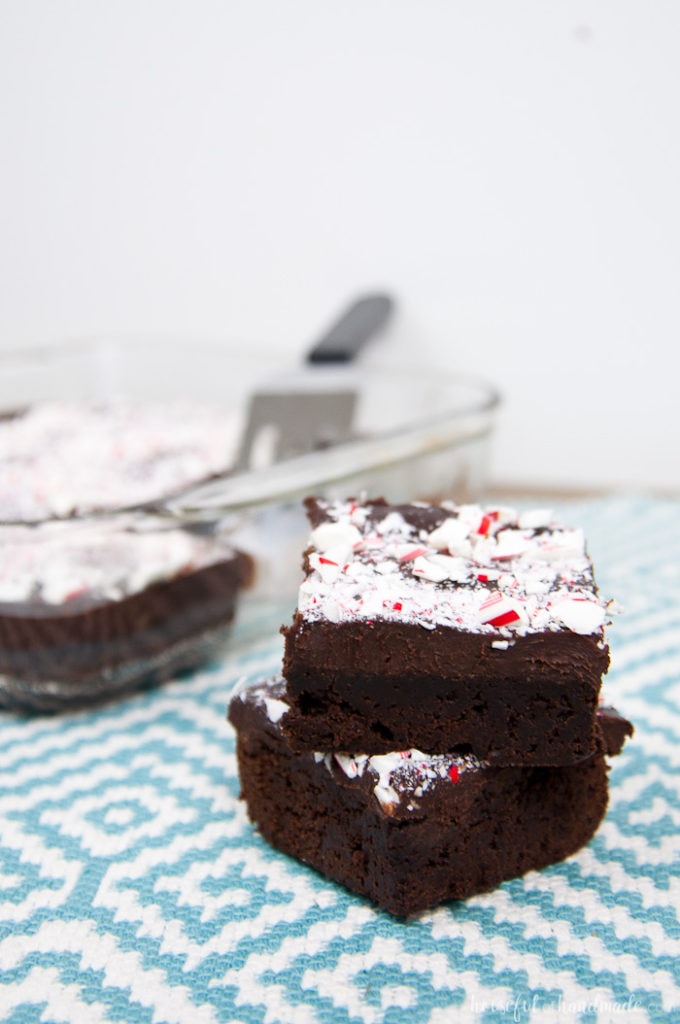 These are the perfect brownies for Christmas! You are going to fall in love with these easy to make Chewy Brownies with Peppermint Ganache. These fudge brownies make the best treats for the season. | Recipe at Housefulofhandmade.com