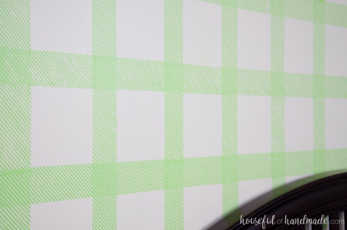 Create an awesome feature wall for your boy's room with this DIY plaid wall. Learn how to make your own stencil and paint it with all these great stencil tips & tricks. | Housefulofhandmade.com