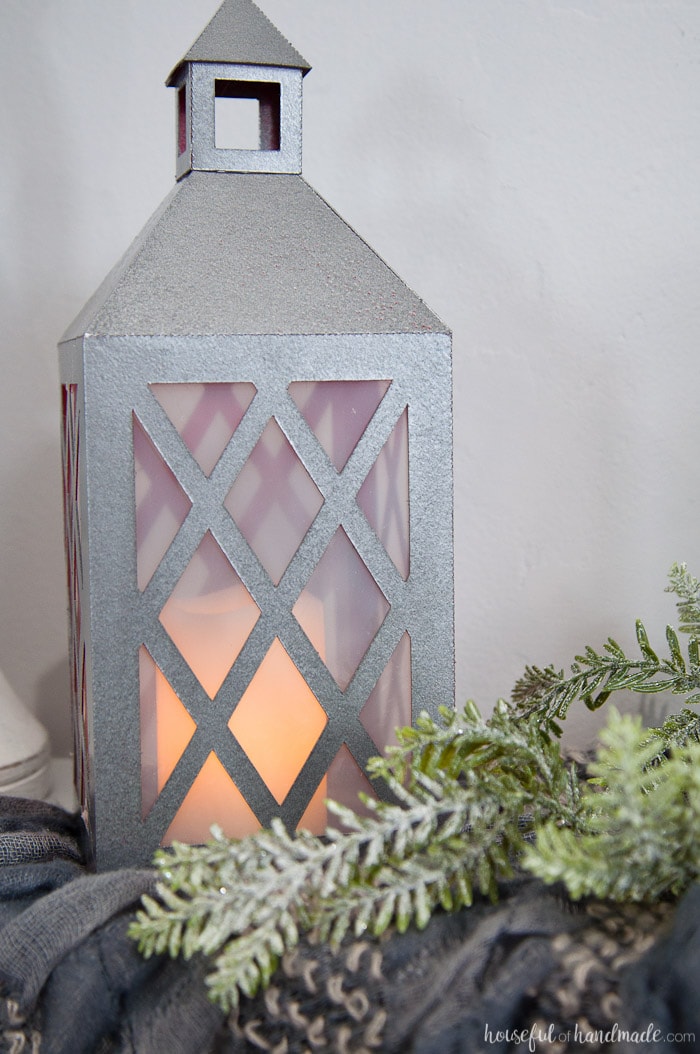 DIY Paper Lantern shown with battery operated candle and pine stems