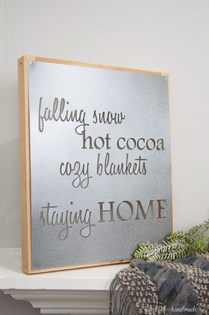 How to Make a Faux Metal Farmhouse Sign inspired by the metal Fixer Upper signs. Housefulofhandmade.com | DIY Metal Sign | DIY Farmhouse Sign | Winter Sign | Winter Mantle | Mantle Decor | Farmhouse Decor | Rustic Decor | Rustic Metal Sign | Stencil Sign | Free Cut File | Silhouette Cameo 