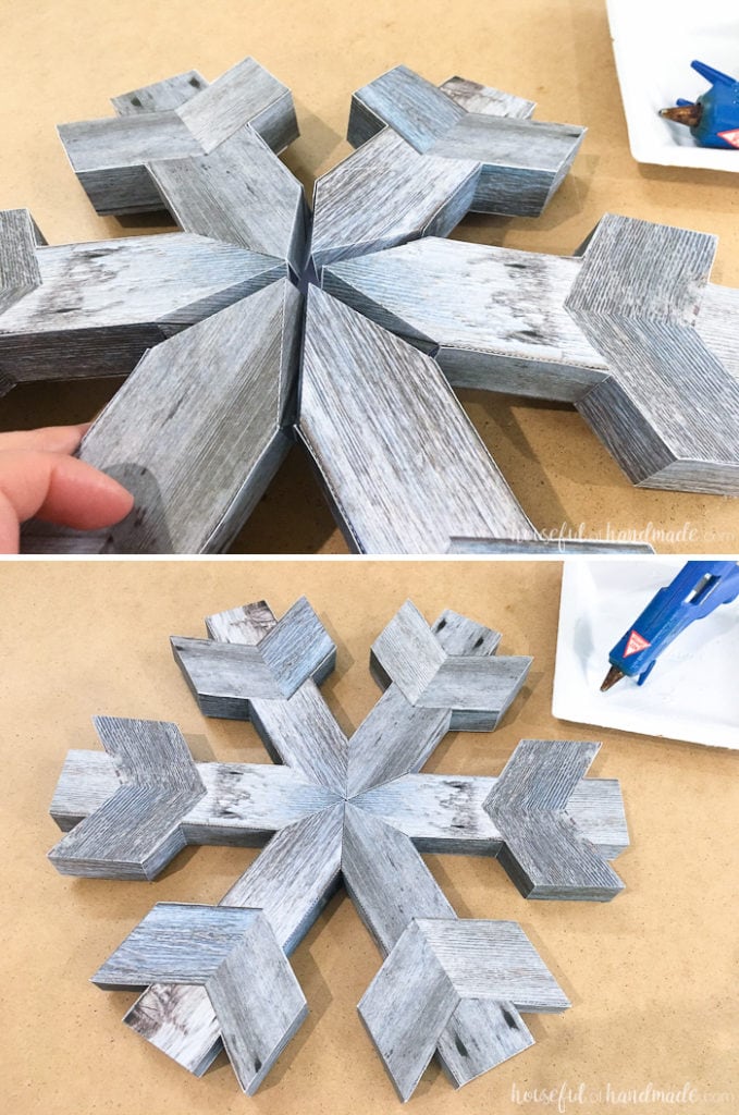 If you don't like power tools you can still get these perfect wood snowflakes for your winter decor. This easy faux wooden snowflake decor is made out of paper but looks just like real wood. Make a bunch to decorate your Christmas tree or winter mantle. | Housefulofhandmade.com