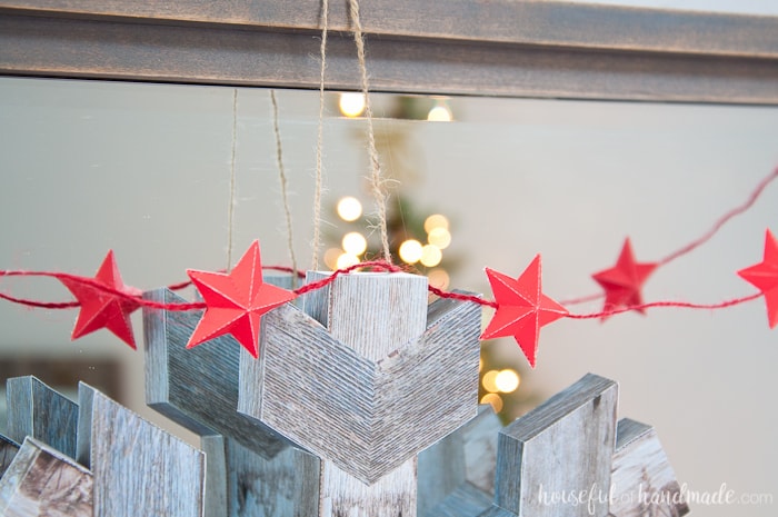 If you don't like power tools you can still get these perfect wood snowflakes for your winter decor. This easy faux wooden snowflake decor is made out of paper but looks just like real wood. Make a bunch to decorate your Christmas tree or winter mantle. | Housefulofhandmade.com