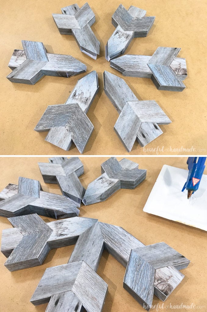 If you don't like power tools you can still get these perfect wood snowflakes for your winter decor. This easy faux wooden snowflake decor is made out of paper but looks just like real wood. Make a bunch to decorate your Christmas tree or winter mantle. | Housefulofhandmade.com