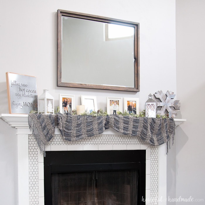 Create the perfect warm and cozy winter mantle. Includes lots of DIY home decor tutorials. | Winter Mantle | Mantle Decor | Neutral Mantle Decor | DIY Mantle Decor | Farmhouse Decor | Farmhouse Fireplace | Rustic Mantle | housefulofhandmade.com