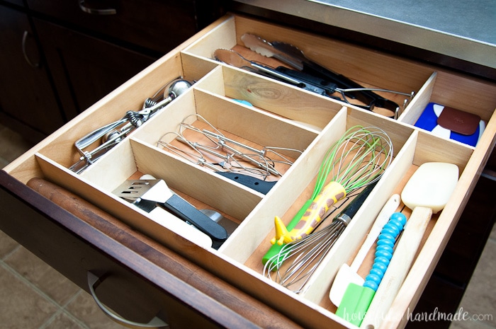 kitchen drawer with utensils separated with an organizer