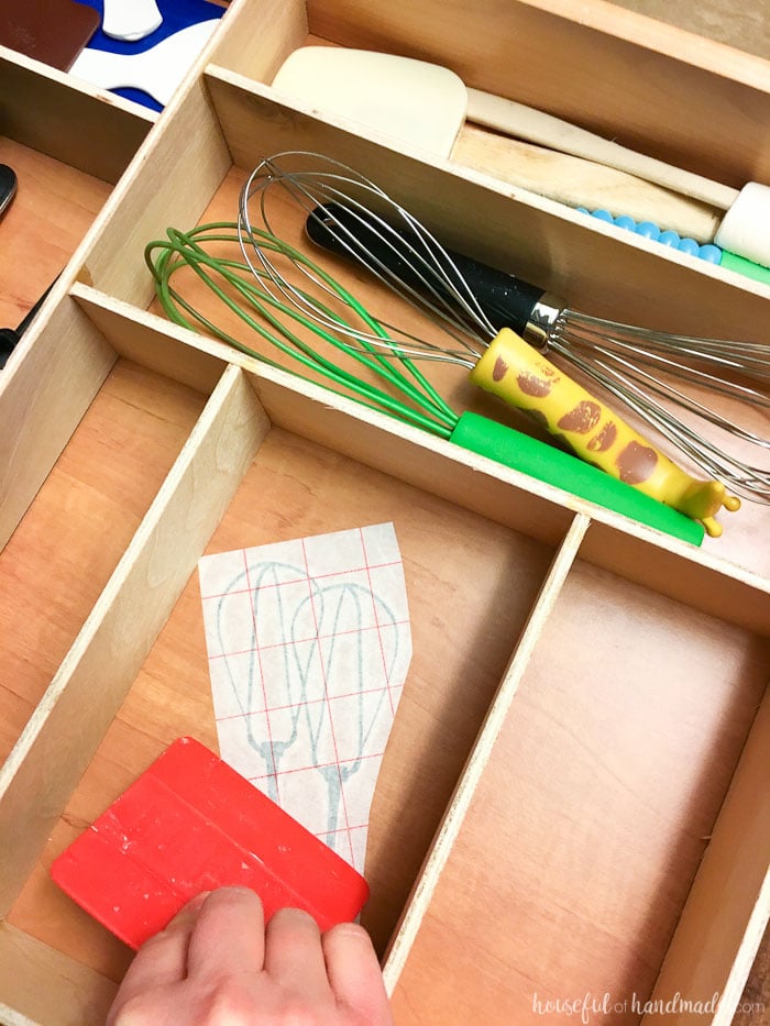 preparing the kitchen drawer for vinyl kitchen utensil drawings