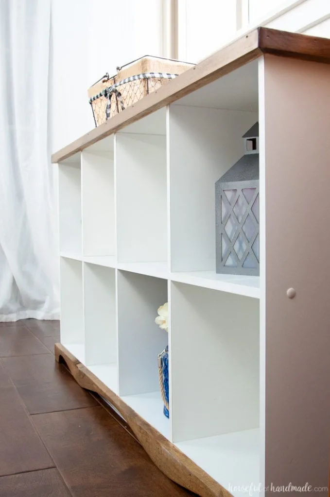 Don't throw out those old melamine bookcases. Create a beautiful farmhouse console table DIY from an upcycled cube bookcase. An easy and inexpensive DIY. Housefulofhandmade.com | Farmhouse Bookcase | Free Build Plans | DIY Console Table | Upcycled Bookcase | Cube Bookcase Storage | Budget Makeover | $100 Room Challenge