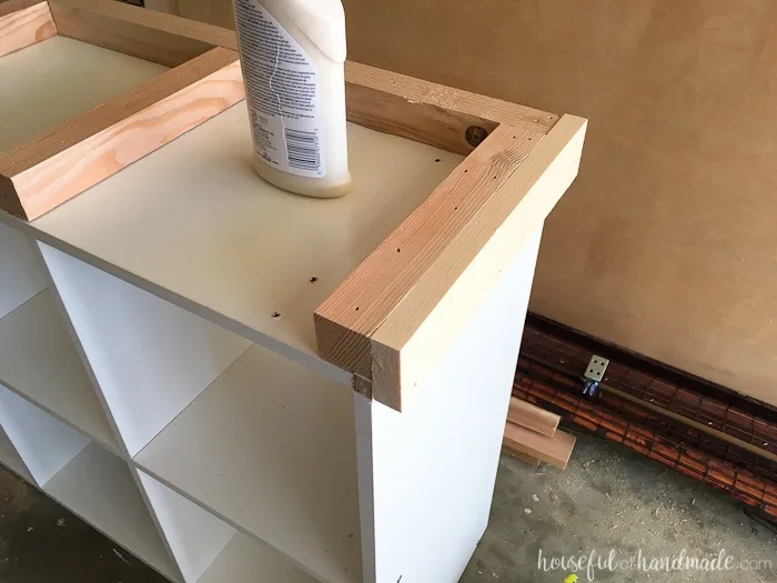 Putting on the base of the console bookcase