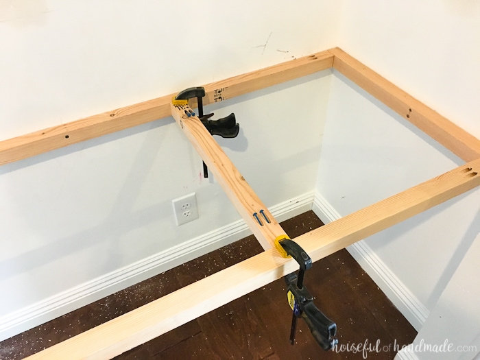 inside of closet shown with desk frame and center braces to the frame