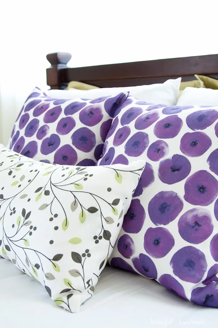 A pop of color is easy to add to your summer bedroom with beautiful throw pillows. Housefulofhandmade.com