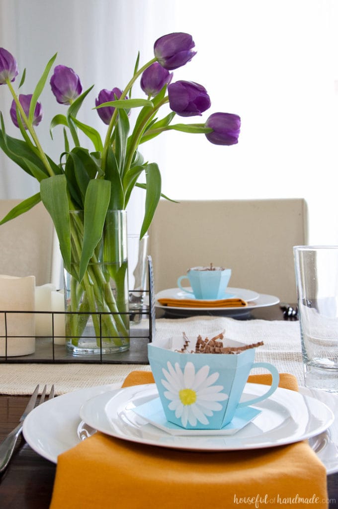 Decorate your home for spring with lots of flowers and color. This easy Spring Tablescape features adorable floral print paper tea cups and lots of sunshine. Housefulofhandmade.com | Spring Tablescape | Easter Tablescape | Mother's Day Brunch | Paper Tea Cups | 3D Tea Cup | Easter Decor | Spring Decor | Farmhouse Decor 