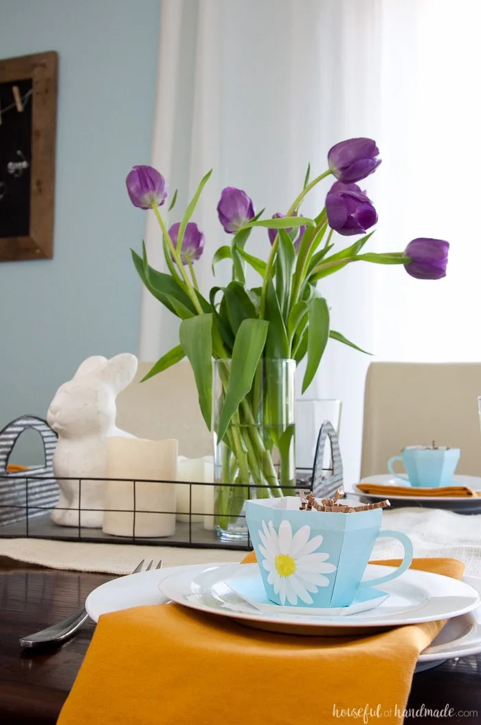 Decorate your home for spring with lots of flowers and color. This easy Spring Tablescape features adorable floral print paper tea cups and lots of sunshine. Housefulofhandmade.com | Spring Tablescape | Easter Tablescape | Mother's Day Brunch | Paper Tea Cups | 3D Tea Cup | Easter Decor | Spring Decor | Farmhouse Decor
