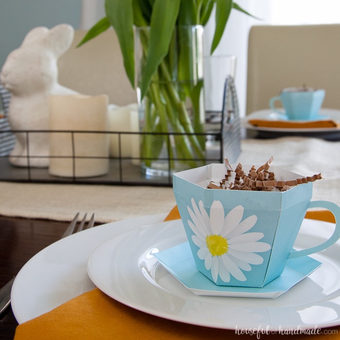 Decorate your home for spring with lots of flowers and color. This easy Spring Tablescape features adorable floral print paper tea cups and lots of sunshine. Housefulofhandmade.com | Spring Tablescape | Easter Tablescape | Mother's Day Brunch | Paper Tea Cups | 3D Tea Cup | Easter Decor | Spring Decor | Farmhouse Decor 