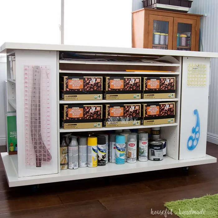 Don't throw out those old cheap bookcases from your college days, upcycle them into the perfect work station. Create this amazing upcycled bookcase rolling work table for your craft room or office. | Housefulofhandmade.com || Craft Table | Rolling Work Table | Upcycled Bookcase | Craft Room Storage | Free Build Plans