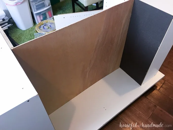 Don't throw out those old cheap bookcases from your college days, upcycle them into the perfect work station. Create this amazing upcycled bookcase rolling work table for your craft room or office. | Housefulofhandmade.com || Craft Table | Rolling Work Table | Upcycled Bookcase | Craft Room Storage | Free Build Plans