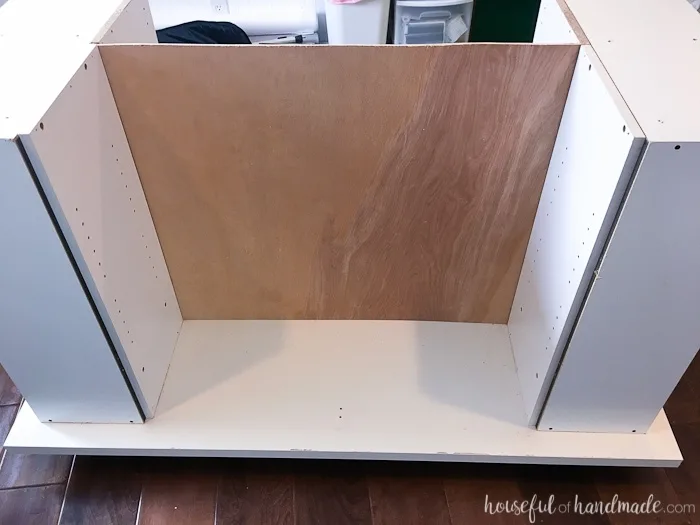 Don't throw out those old cheap bookcases from your college days, upcycle them into the perfect work station. Create this amazing upcycled bookcase rolling work table for your craft room or office. | Housefulofhandmade.com || Craft Table | Rolling Work Table | Upcycled Bookcase | Craft Room Storage | Free Build Plans