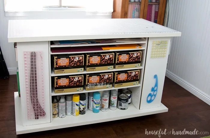 Don't throw out those old cheap bookcases from your college days, upcycle them into the perfect work station. Create this amazing upcycled bookcase rolling work table for your craft room or office. | Housefulofhandmade.com || Craft Table | Rolling Work Table | Upcycled Bookcase | Craft Room Storage | Free Build Plans