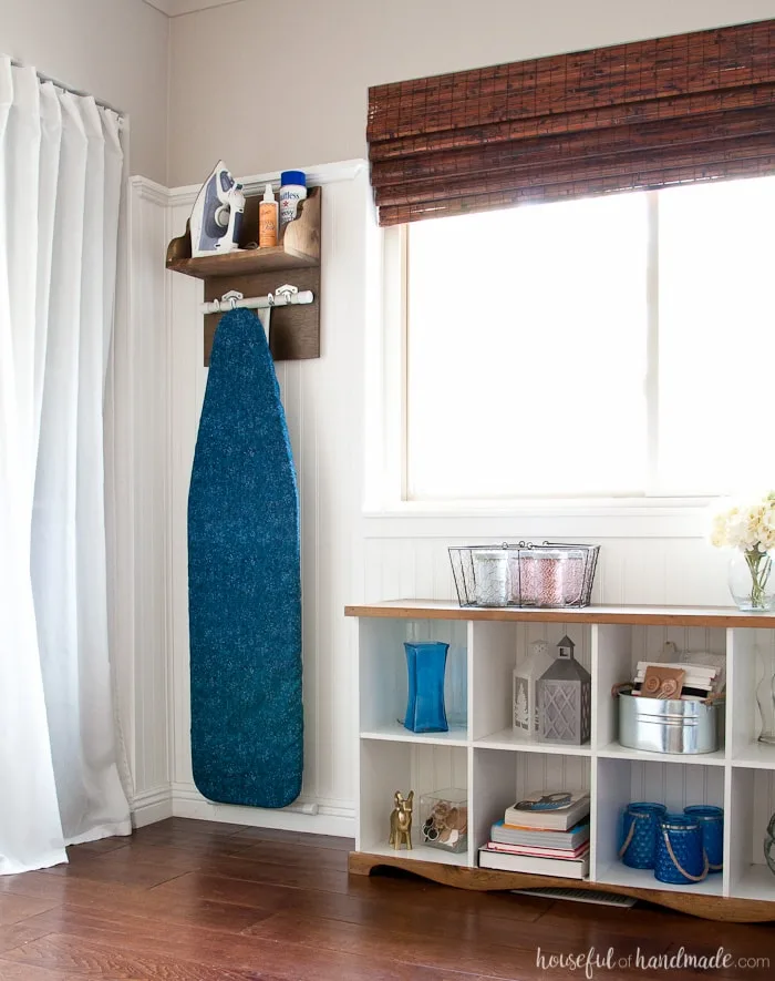 Create the perfect place to store your iron and supplies. This easy DIY Iron Holder with Ironing Board Storage is a quick build that will keep your laundry room or craft room organized. Free build plans on Housefulofhandmade.com | Laundry Room Storage Ideas | Ironing Board Hanger | Iron Shelf | Things to Build with Scraps | $100 Room Challenge