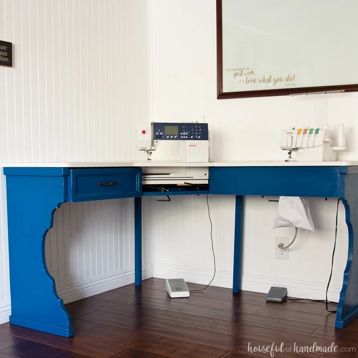 Transform an old utilitarian table into a beautiful farmhouse craft table with this sewing machine table makeover. The beautiful table legs were created on a budget to transform the basic table into a piece of furniture with lots of style. Housefulofhandmade.com | Furniture Makeover | Chalk Paint Makeover | Farmhouse Table Legs | Sewing Desk | $100 Room Challenge