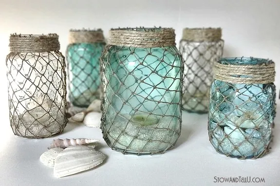 Ways to Upcycle Glass Jars & Bottles: Upcycle jars wrapped with fisherman netting from Stow and Tell.