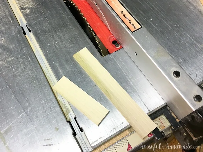1/4" thick boards sitting on a table saw. 