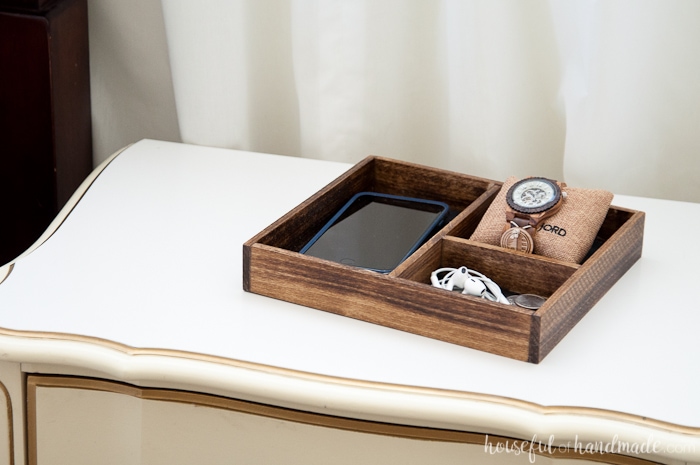 Celebrate the man in your life with these perfect anniversary gifts for him. A DIY wood and leather nightstand tray for him to unload his pockets into. And to make it extra special, fill it with a beautiful wood watch so he will think of you whenever he checks the time. Housefulofhandmade.com | Gifts for Dad | Gift Ideas for Him | DIY gift ideas | Men's Watch | DIY Nightstand Tray | DIYI Catchall Tray