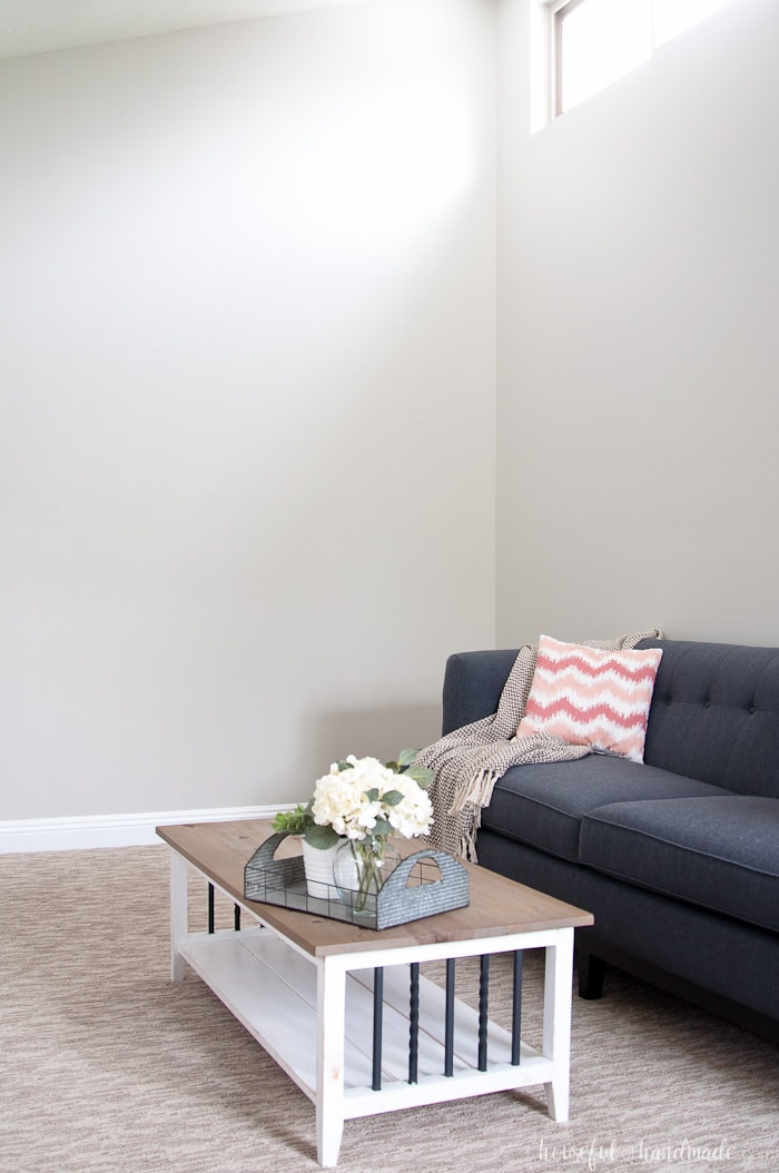 Coffee table and couch in room with Sherwin Williams Greige