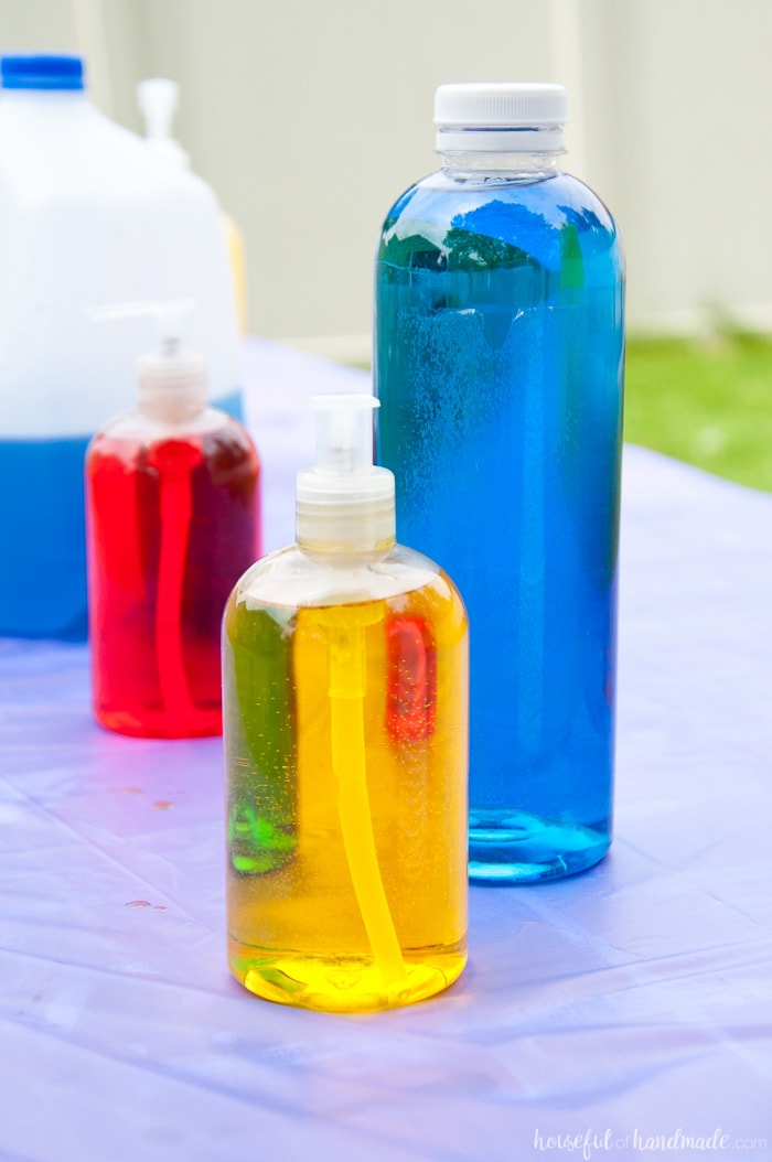 colored soap in a bottles for a kids science themed birthday party