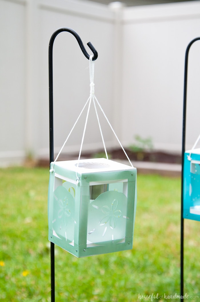 Create beautiful beach themed decor for the backyard with scrap wood, cheap solar path lights and your Silhouette Cameo. These coastal solar lantern decor will give beautiful lighting to the warm summer evenings. A fun and easy DIY for summer decorating. Housefulofhandmade.com | Silhouette Creators Challenge | Silhouette Crafts | Outdoor Crafts | DIY Solar Lanterns | Decorative Solar Lights 