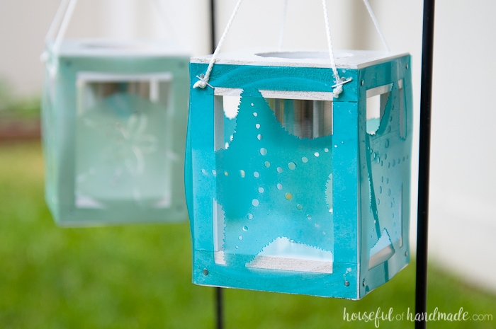 Create beautiful beach themed decor for the backyard with scrap wood, cheap solar path lights and your Silhouette Cameo. These coastal solar lantern decor will give beautiful lighting to the warm summer evenings. A fun and easy DIY for summer decorating. Housefulofhandmade.com | Silhouette Creators Challenge | Silhouette Crafts | Outdoor Crafts | DIY Solar Lanterns | Decorative Solar Lights 