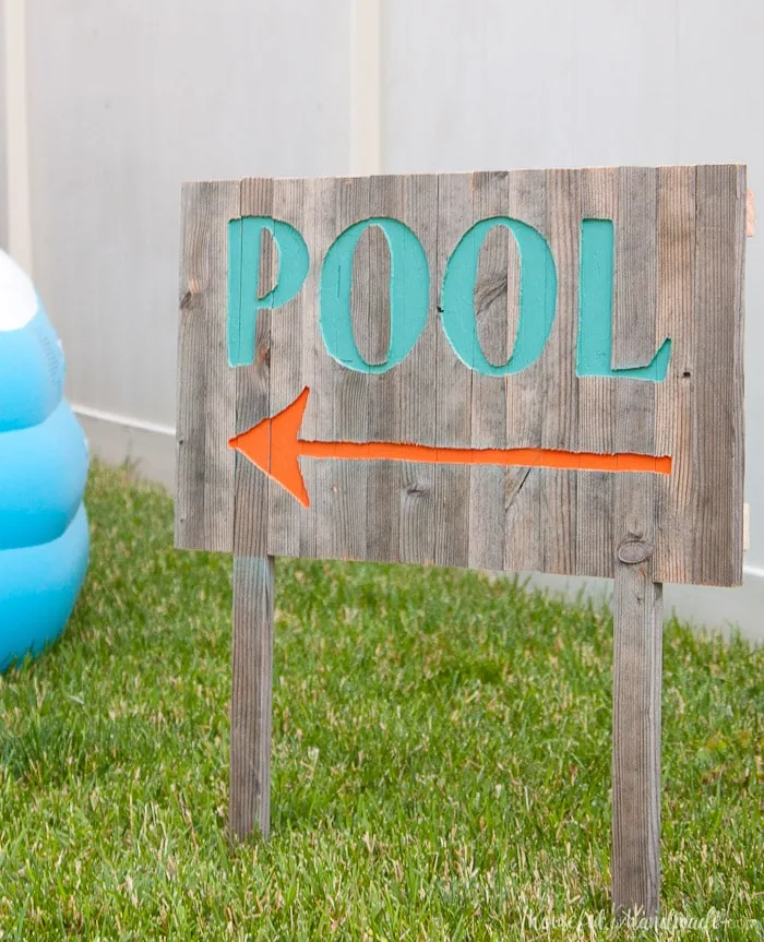 Create the perfect outdoor decor for summer with this DIY wood sign with a router. Using reclaimed wood, the 3D pool sign is perfect for your next party! Housefulofhandmade.com | Router Sign | Reclaimed Wood Sign | How to Make a Sign with a Router | Scrap Wood Projects | Summer Sign | Outdoor Sign