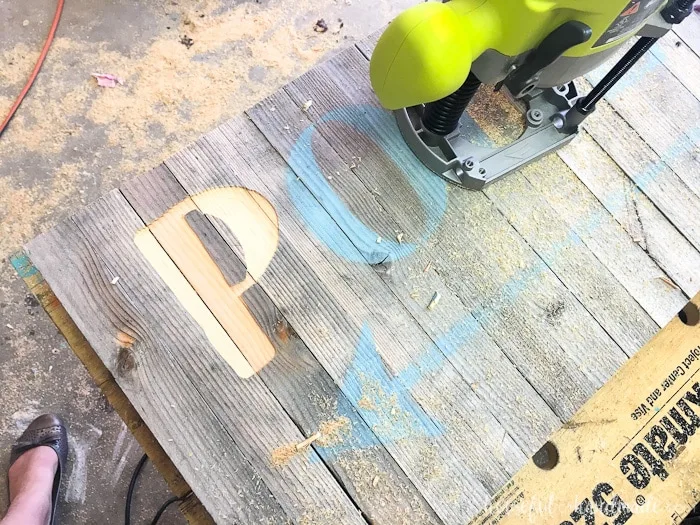 Create the perfect outdoor decor for summer with this DIY wood sign with a router. Using reclaimed wood, the 3D pool sign is perfect for your next party! Housefulofhandmade.com | Router Sign | Reclaimed Wood Sign | How to Make a Sign with a Router | Scrap Wood Projects | Summer Sign | Outdoor Sign