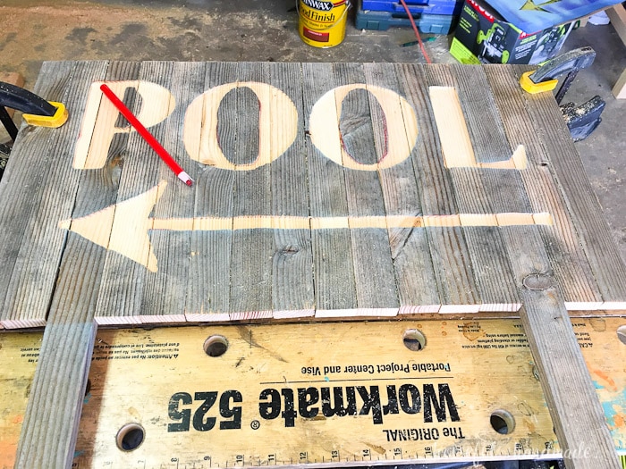 Create the perfect outdoor decor for summer with this DIY wood sign with a router. Using reclaimed wood, the 3D pool sign is perfect for your next party! Housefulofhandmade.com | Router Sign | Reclaimed Wood Sign | How to Make a Sign with a Router | Scrap Wood Projects | Summer Sign | Outdoor Sign